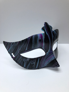 Side view of black, purple, blue mask
