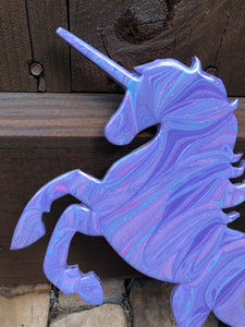 Close up of the purple, blue, pink unicorn horn
